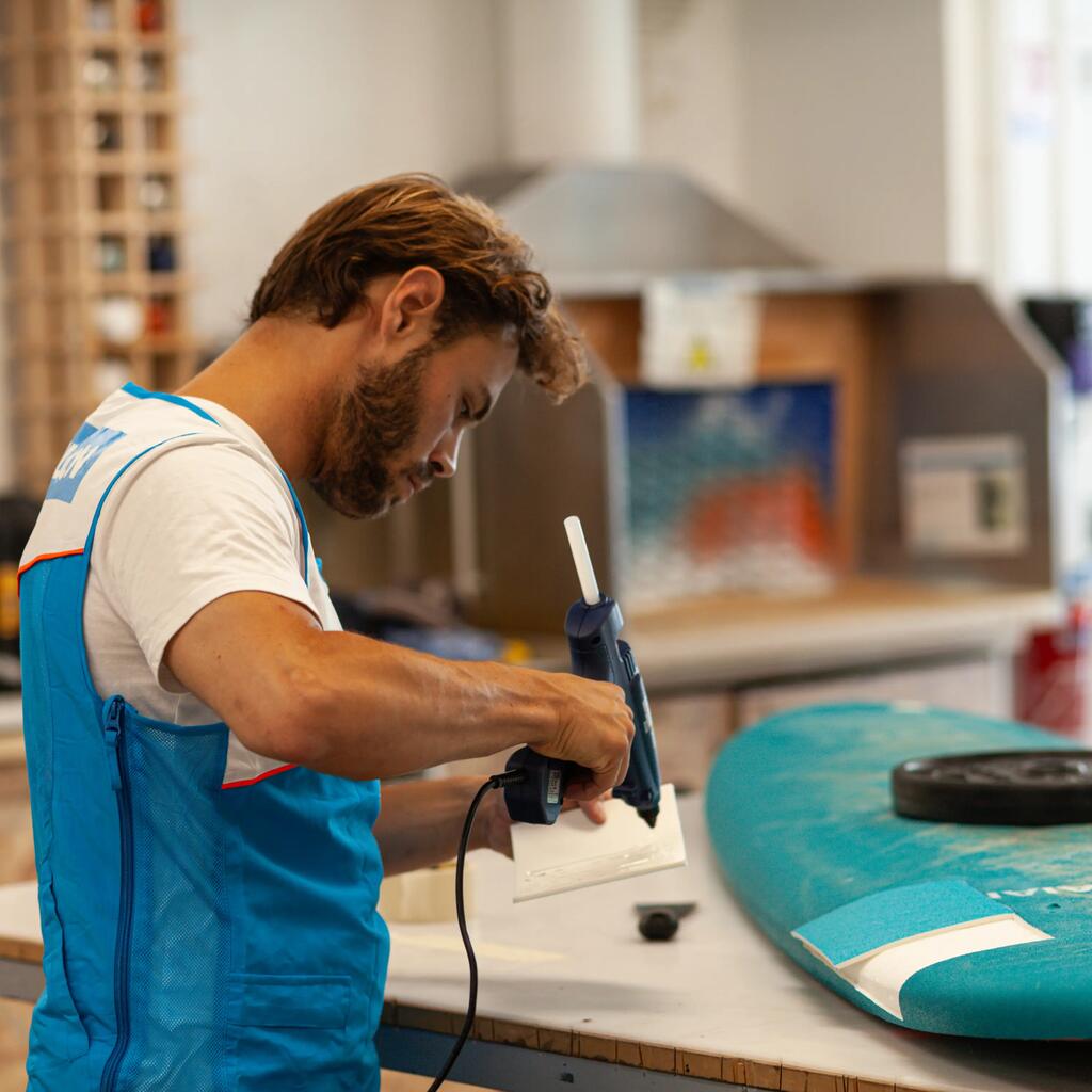 Foam surfboard repair blister on rail